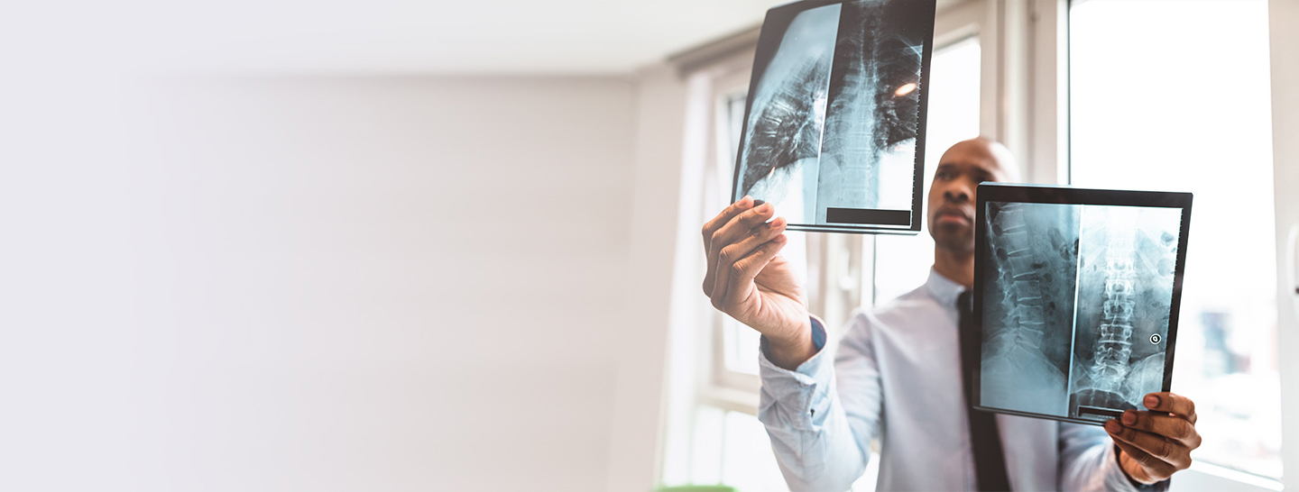 doctor examining xray