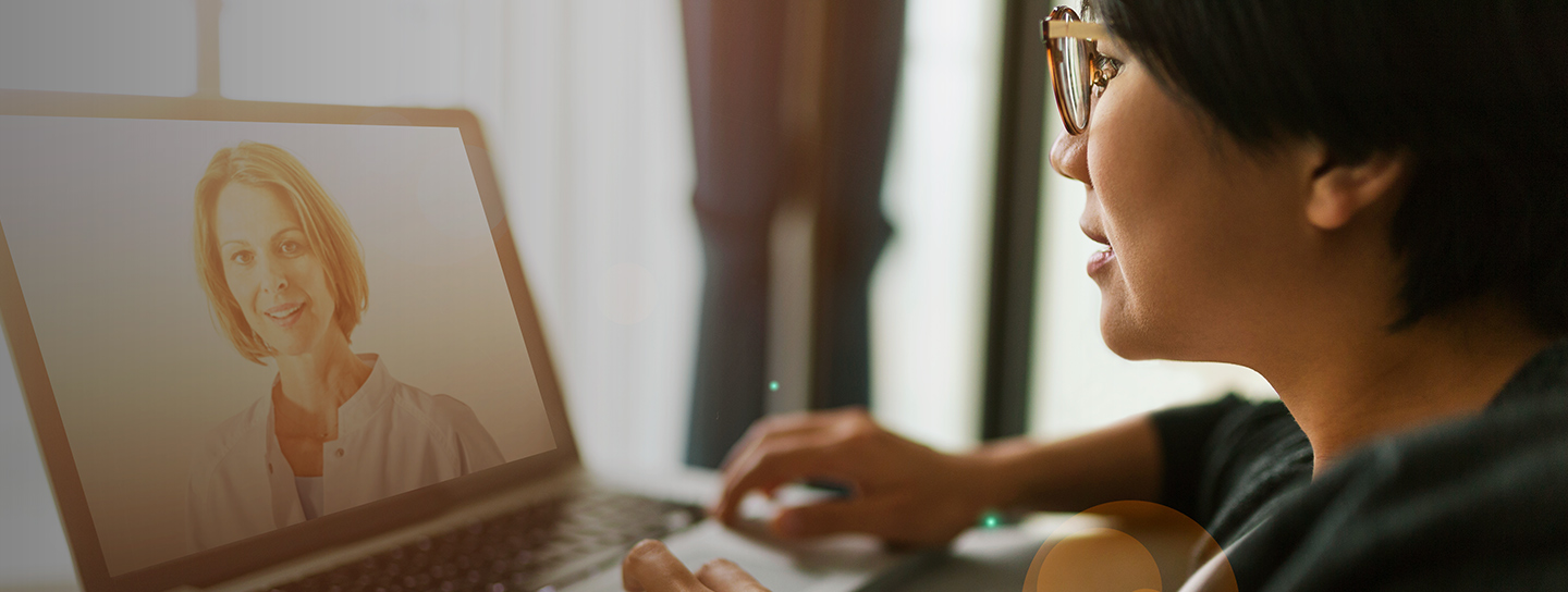 woman looking at computer