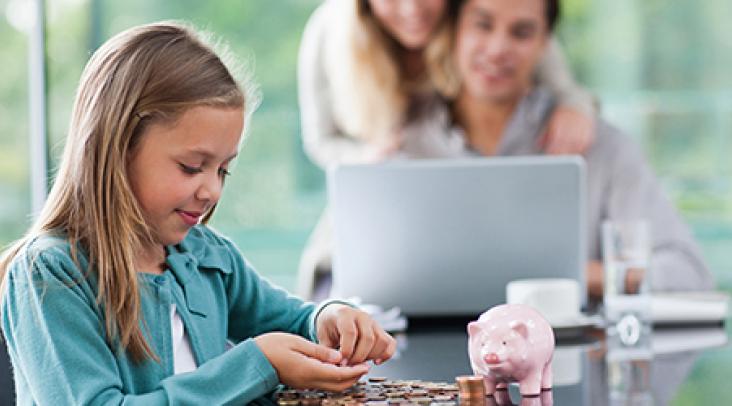 girl counting coins